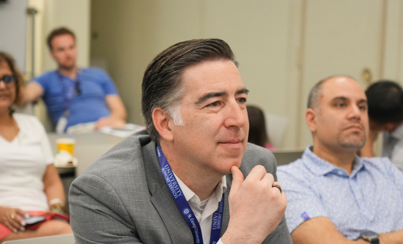 his March, nearly 50 alumni from St. George’s University School of Medicine returned to the True Blue campus and to the island where for many, it all began