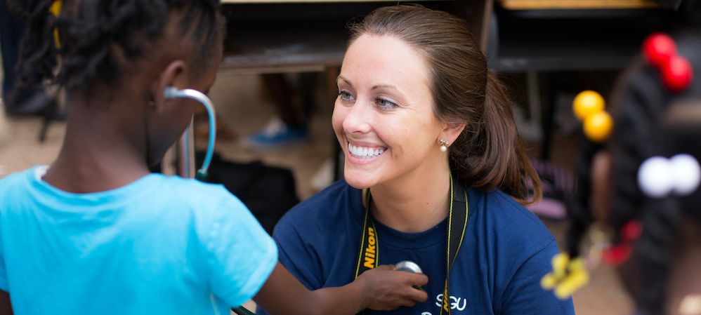 Pediatrician with child
