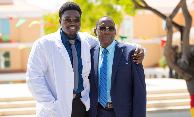 Student celebrating White Coat Ceremony