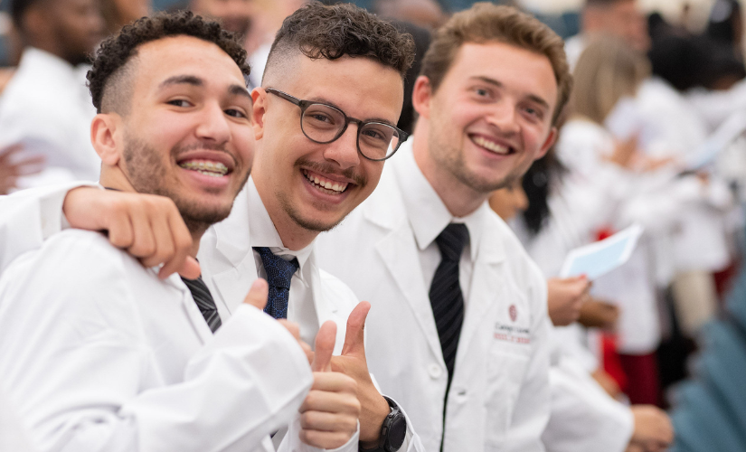 Students celebrating White Coat Ceremony News