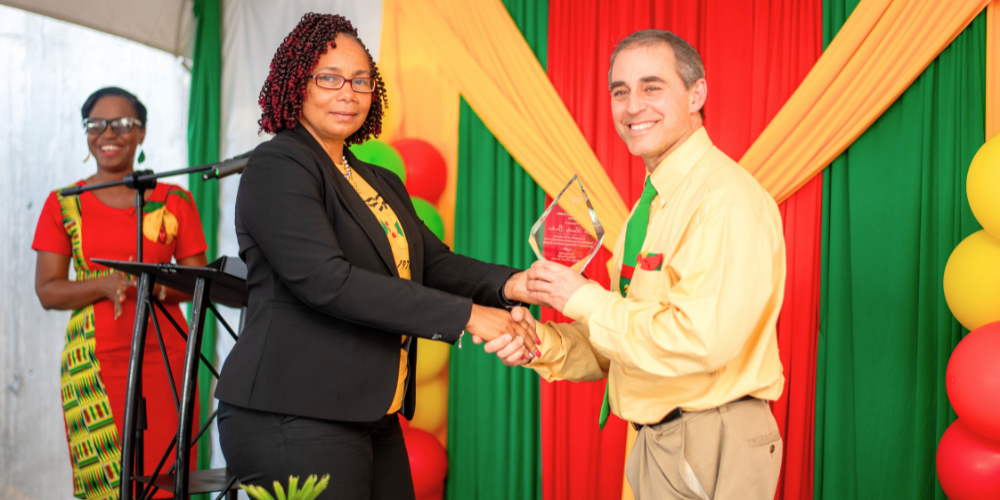 Dr. Randy Becker receives award at Alumni Ribbon-Cutting Ceremony
