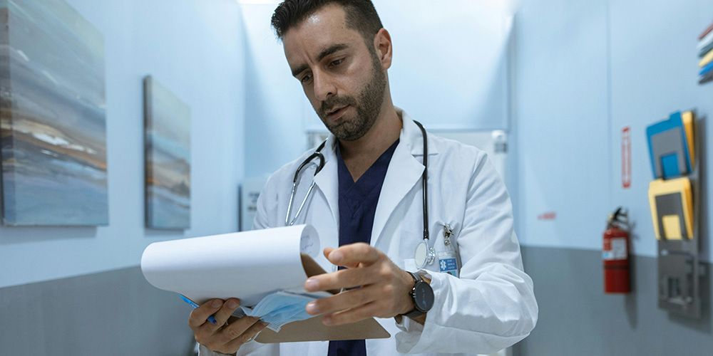 Physician Reviewing Chart