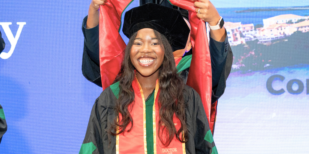 Student being hooded at Botswana Commencement Ceremony