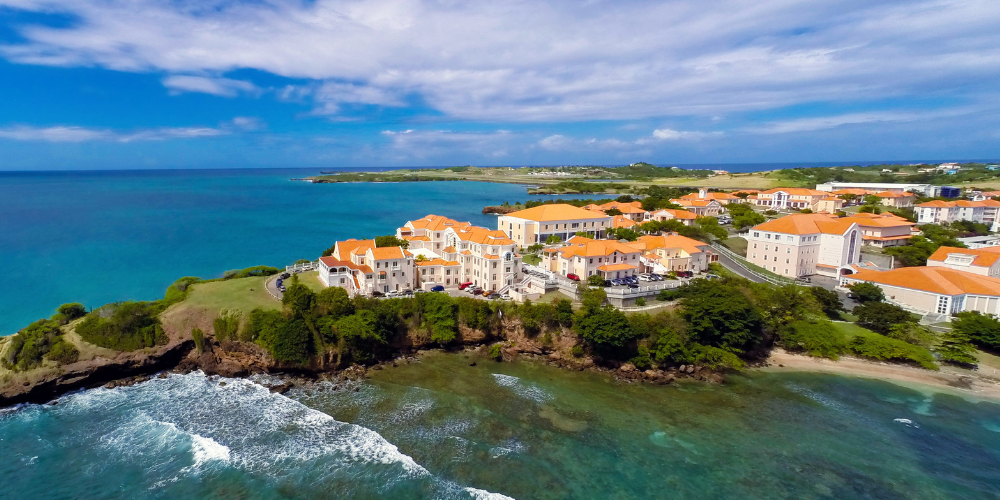 Photo of SGU campus surrounded by water and blue sky News