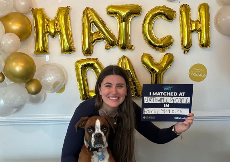 Student showing Match Sign