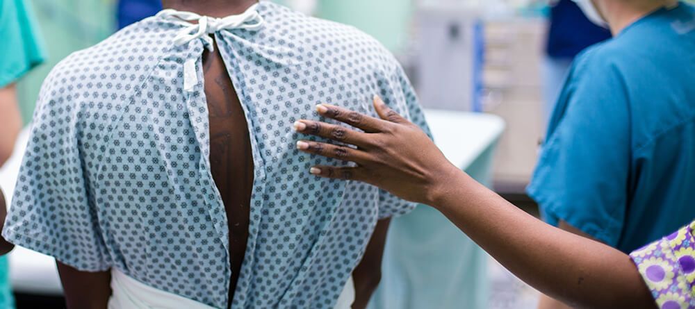 Doctor guiding patient