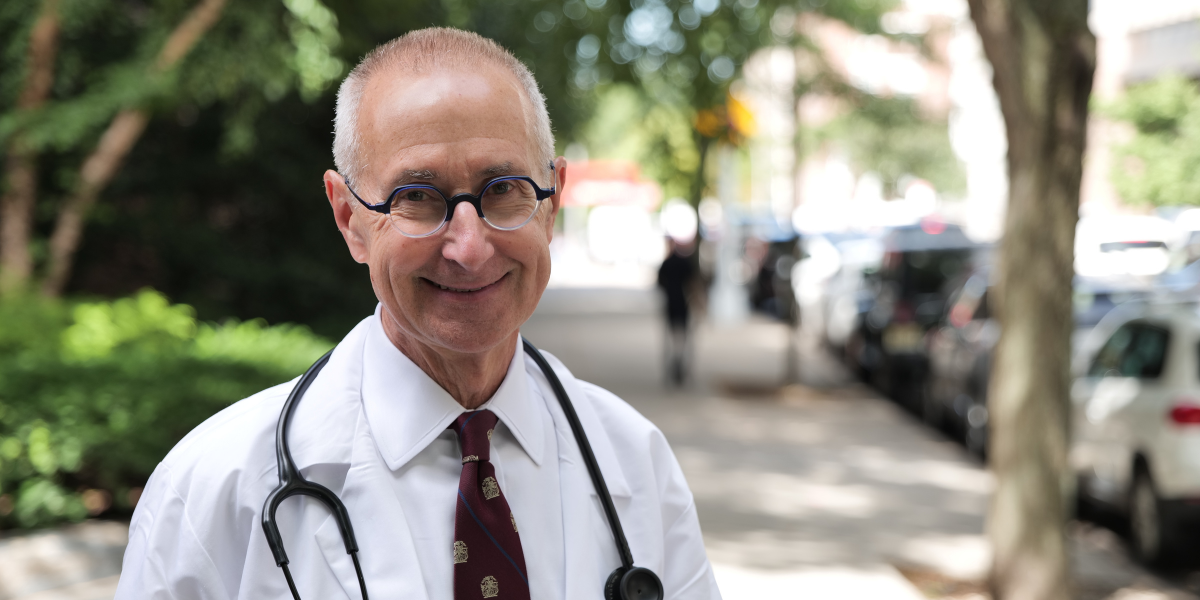 Dr. James Rucinski standing outside wearing a white lab coat News