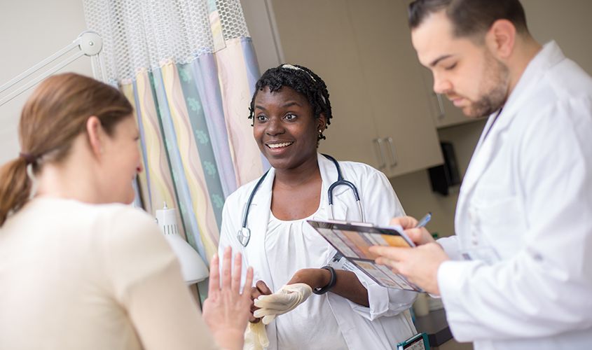 Group of SGU future physicians participating in hands-on learning at the medical school. News