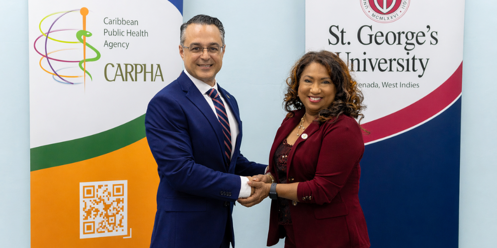 Dr. Marios Loukas and Dr. Lisa Indar at the SGU-CARPHA MOU signing