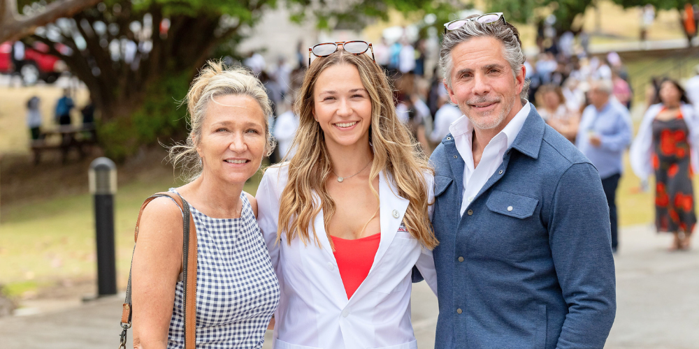 Term 1 SOM student, Corinne Batsides and her parents at Spring 2026 SOM White Coat Ceremony