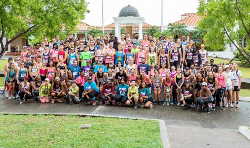 Participants in St. George's University's Women in Medicine (WIM) 5K Pink Run/Walk, raising breast cancer awareness in Grenada.