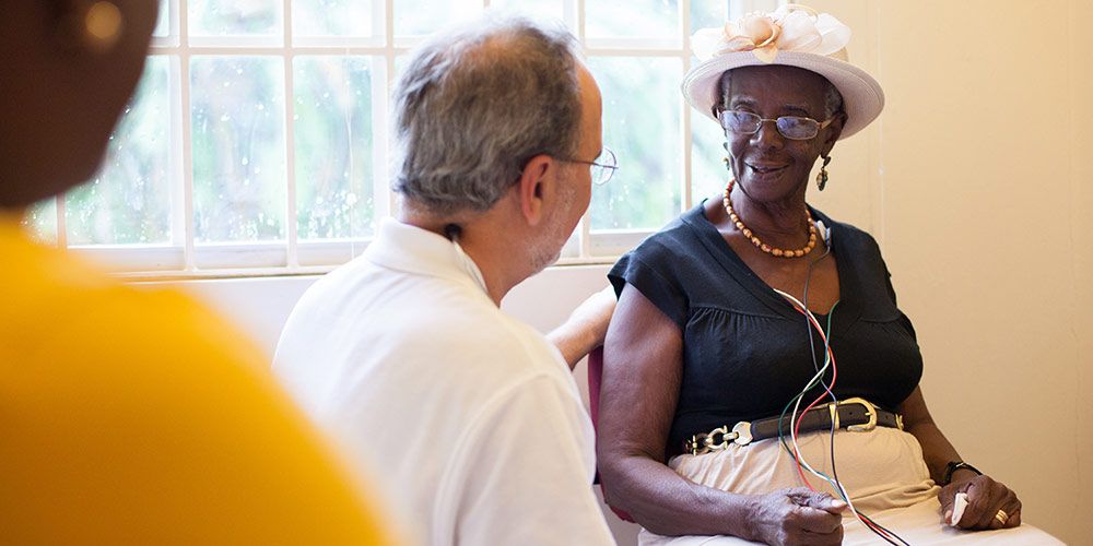 Cardiologist with female patient