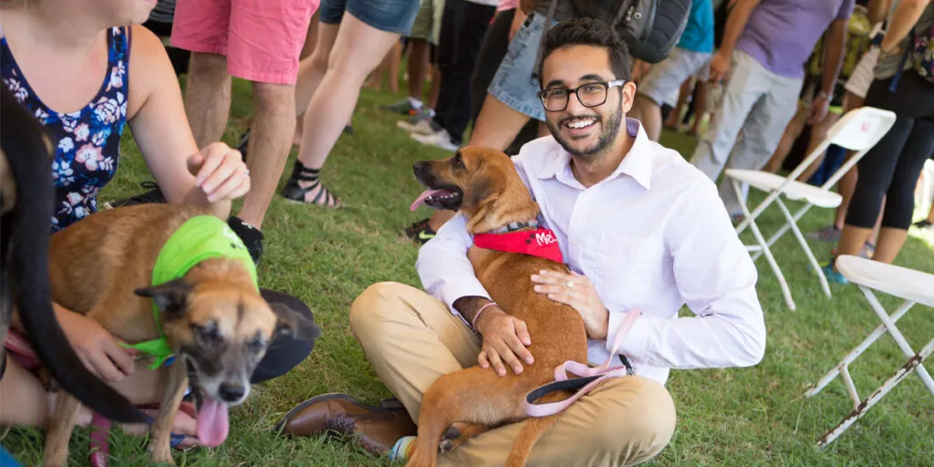 Student with puppy
