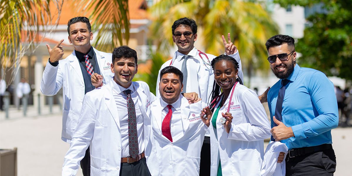 Students celebrating their white coats