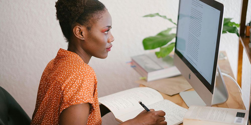 Woman studying at computer