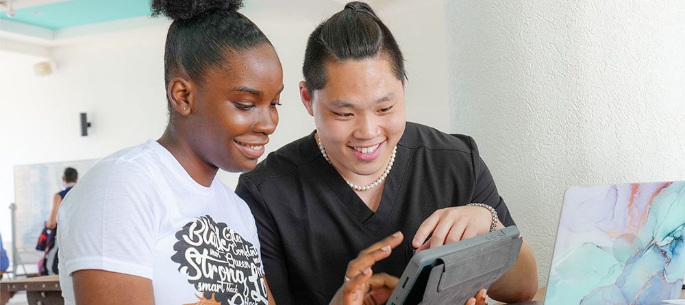 medical students studying on tablet