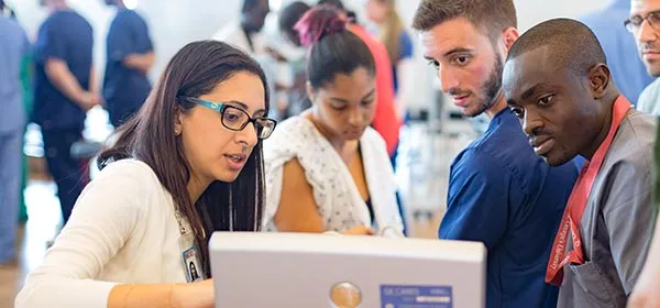 Students engaged in anatomy learning session.